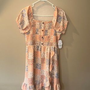 Girls floral sun dress. Size XXL (18)
